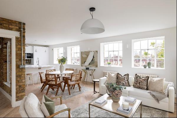 A collection of three new lateral three bedroom apartments within a converted warehouse in