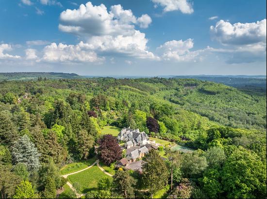 An impressive and important period country house on the edge of Marley Common with breatht