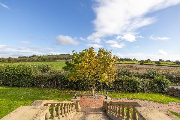 A fabulous detached 1930’s home with stables and paddock adjoining farmland and superb ope