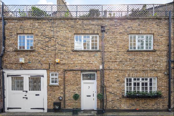 A charming two/three bedroom freehold house for sale on a quiet cobbled mews in SW5