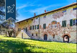 For sale majestic 12th century complex in the hinterland of Genoa, surrounded by 78 hectar