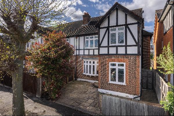 A five bedroom semi-detached house for sale in Wimbledon.