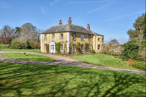 A wonderful, late 18th century country house set in over 20 acres amidst beautiful and uns