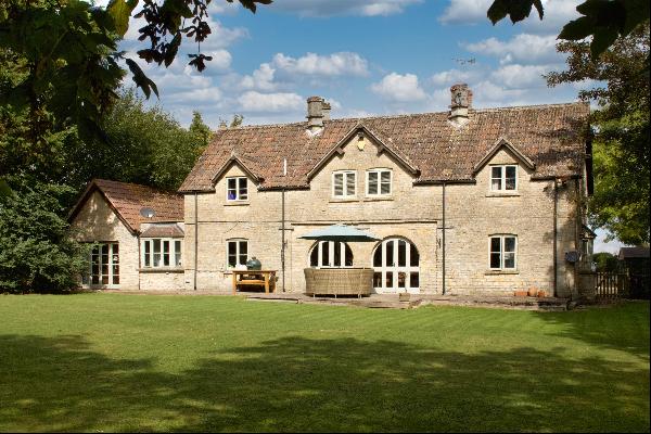 A four bedroom period country home with three one bed studio flats.