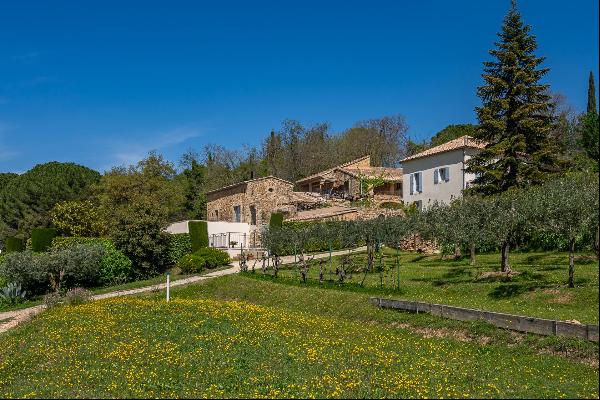 Property with panoramic view in Provençal garden near Avignon.