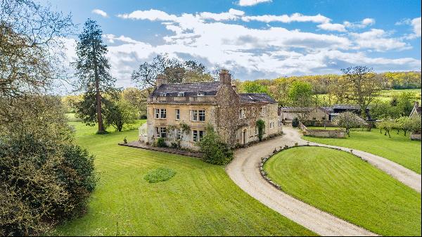 A 9 bedroom Georgian house, with cottage, equestrian facilities and 44 acres with addition