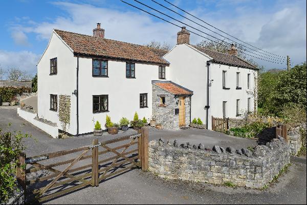 A detached well-presented south facing farmhouse with detached barn, orchard and paddock, 