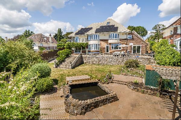 An impressive, detached home with luxury accommodation and two annexes, in a popular Exmou