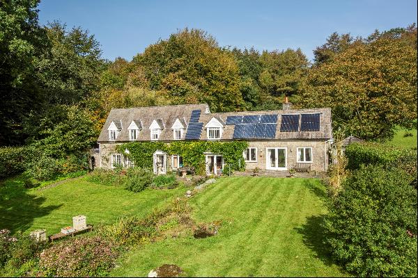 A detached country house located in a wonderful tranquil position with far-reaching views 