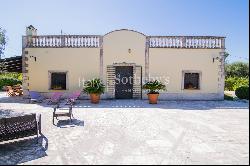 Classic-style villa with trulli and swimming pool