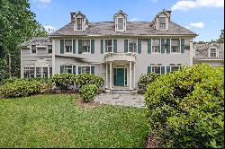 Pristine Home with Grand Foyer and Curved Staircase