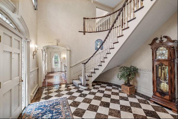 Pristine Home with Grand Foyer and Curved Staircase
