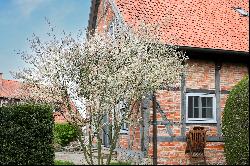 Historic half-timbered house directly on the landscape protection area