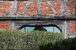 Historic half-timbered house directly on the landscape protection area