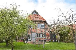 Historic half-timbered house directly on the landscape protection area