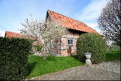 Historic half-timbered house directly on the landscape protection area