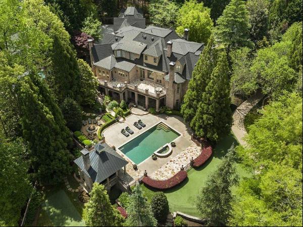 Gated Estate Oasis with Stunning Landscaping