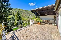 For sale in Lugano-Odogno: a delightful villa featuring an outdoor swimming pool, a detac