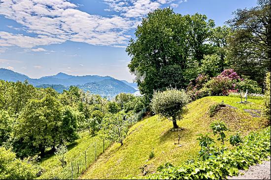 Lugano-Bosco-Luganese: for sale exclusive building plot of 3,581 sqm surrounded by greener