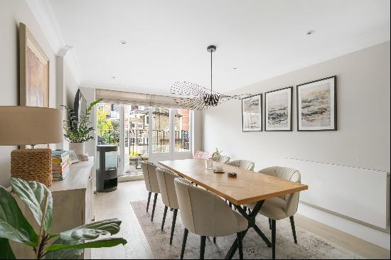 A stylish three-bedroom, split-level apartment, with a south-west facing terrace.