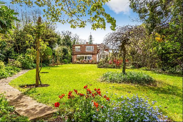 A generous family home set within almost half an acre of beautiful gardens on the doorstep