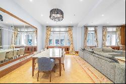 Light and modern four-bedroom flat with Sloane Street views