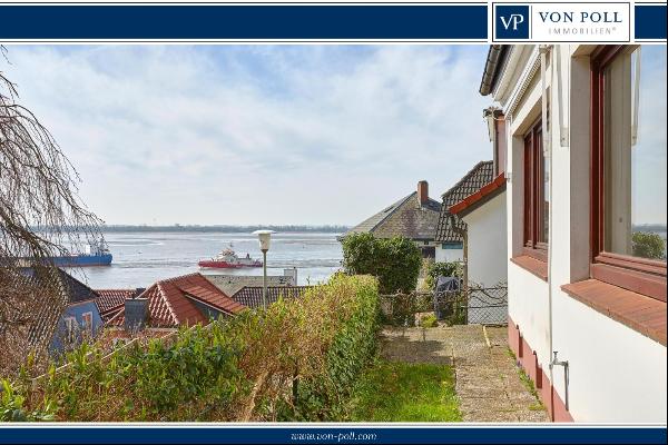 Historic pilot house with a view of the Elbe
