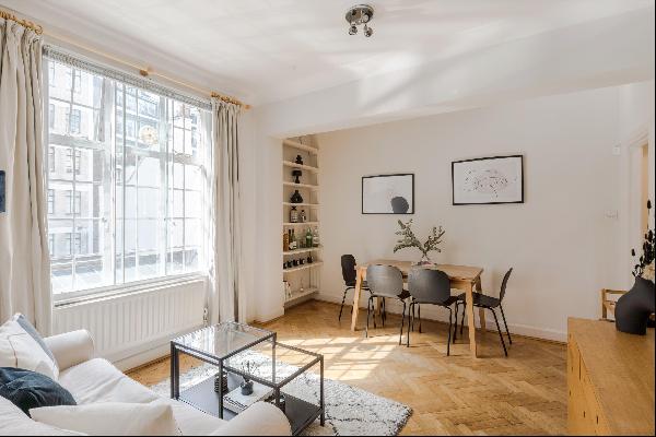 A charming apartment on the first floor of a well maintained, portered mansion block in Ma