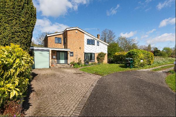 An impressive detached house, set within a plot of just under 0.25 acre, with far reaching