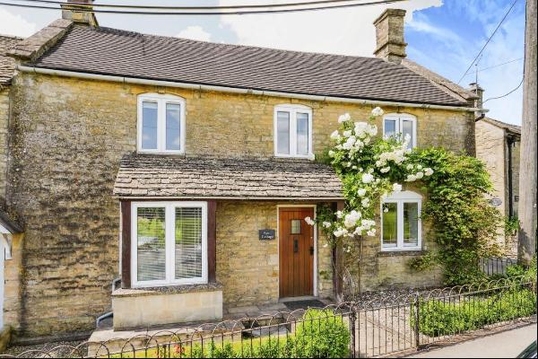 A pretty and beautifully refurbished Cottage in the heart of a thriving village with views