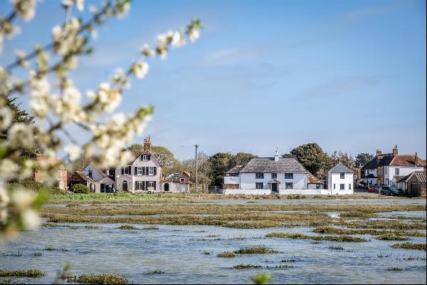 A stunning Grade II listed Tudor village house with guest house, in one of the most sought