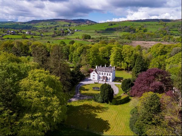 A Grade II* Georgian country house, surrounded by approximately 24.35 acres, in a beautifu