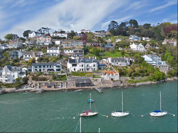 An exceptional waterfront family house with spectacular views across the River Dart and ou