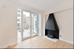 Recently refurbished top floor flat with roof terrace in Marylebone