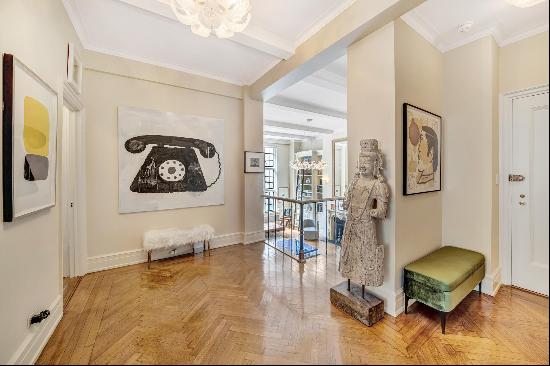 This impressive home, Residence 7E at 14 E 75th St, a prestigious boutique coop with in