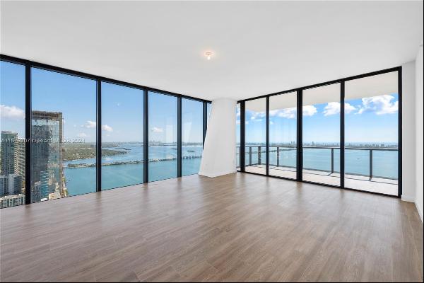 Exquisite living at Elysee in Edgewater! Furnished 4 BR, 4.5 BA + den with 4,557 SF of gen