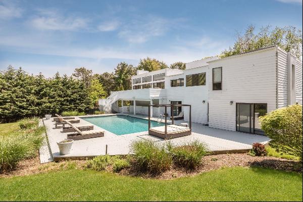 Southampton 1.02 +/- acre, private Contemporary is modern, sleek and very convenient to al