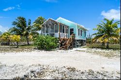 Beachfront Acreage Home With 2 Cottages - MLS 57571