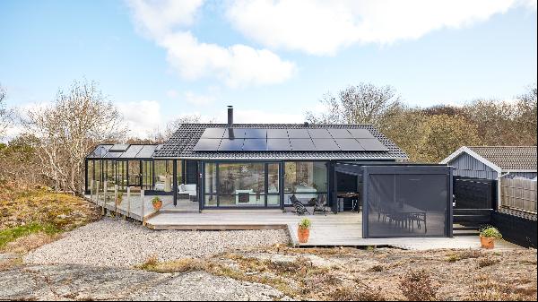 Newly built house with orangery and pergola in a secluded location
