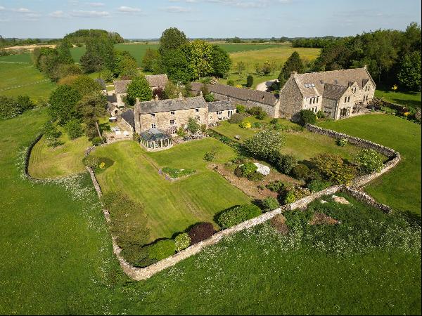 A beautiful Grade II listed house with 7 acres and exceptional Cotswolds views