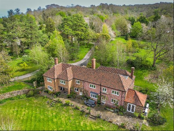 A small family estate with farmhouse, large entertaining barn, cottages and outstanding eq