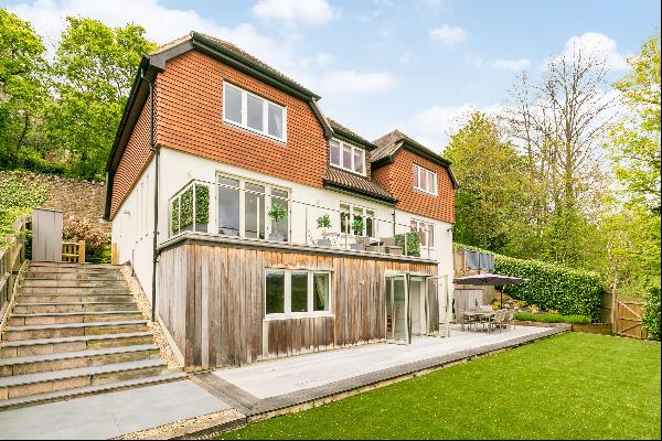 A substantial and highly versatile family house with incredible views across Godalming and