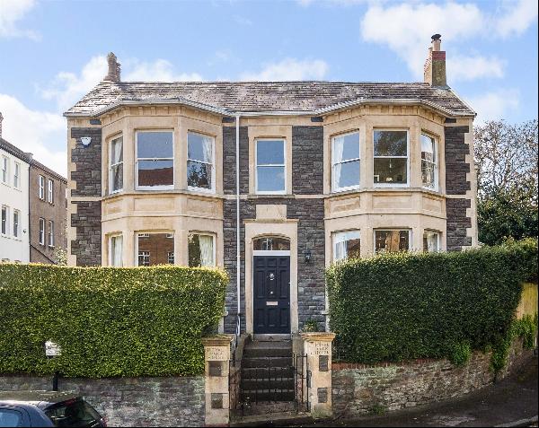 An impressive detached Victorian family home in the heart of Clifton with private gated pa