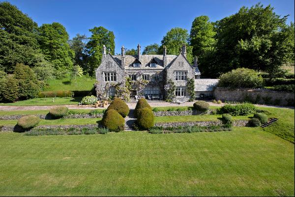 An elegant country house and separate cottage, set in established grounds of about 31 acre