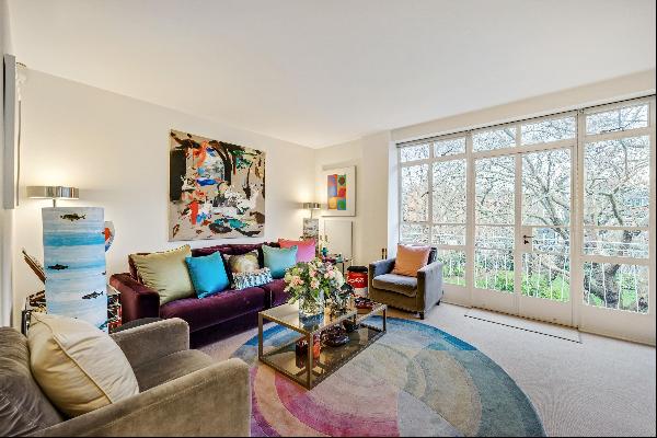 A bright one bedroom third floor flat overlooking the gardens of Hans Place
