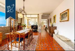 Exclusive luxury apartment with boundless views of the Tuscan hills surrounded by leafy Fl