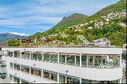 Lugano-Castagnola: elegant central penthouse apartment with large roof terrace & enchanti