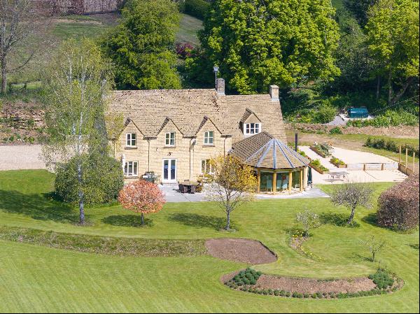 A four bedroom country house with a separate barn and office, set in approximately 2.79 ac