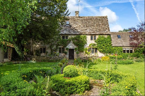 An idyllic and beautifully presented five bedroom Grade II listed house with delightful ga