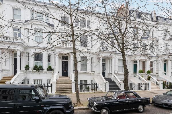 A beautiful first floor flat for sale on Palace Gardens Terrace, W8.